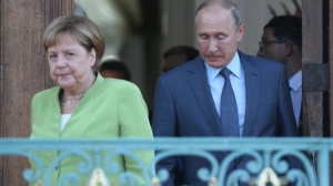 merkel-9-saatliq-danisiqlardan-sonra-putin-sen-qalib-geldin